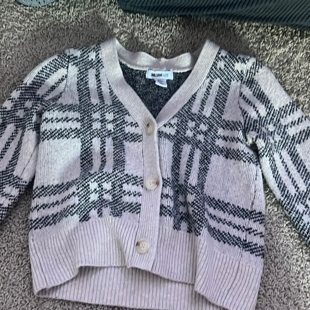 This is a plaid sweater. A little cropped.